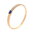 Wasserdichter Armreif mit blauem Kristall Goldfarbe